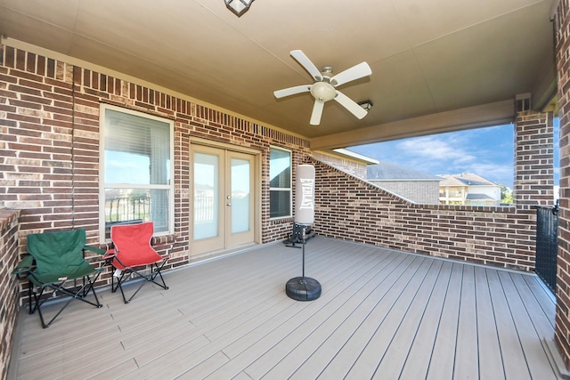 9003 Alps Peak Ct, Richmond, TX 77407 - wooden deck with french doors and a ceiling fan