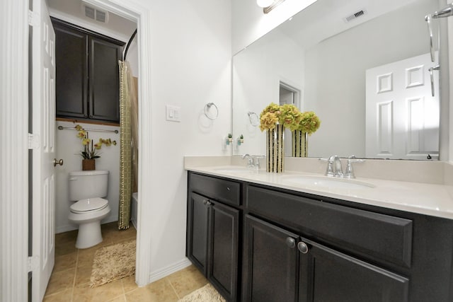 9003 Alps Peak Ct, Richmond, TX 77407 - full bathroom featuring double vanity, tile patterned floors, and shower / bath combo with shower curtain