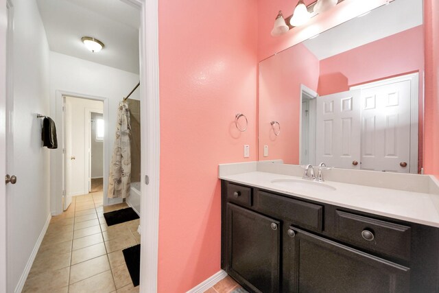 9003 Alps Peak Ct, Richmond, TX 77407 - bathroom with vanity, tile patterned floors, and shower / bath combo