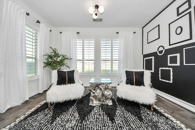 9003 Alps Peak Ct, Richmond, TX 77407 - sitting room featuring healthy amount of natural light and wood finished floors