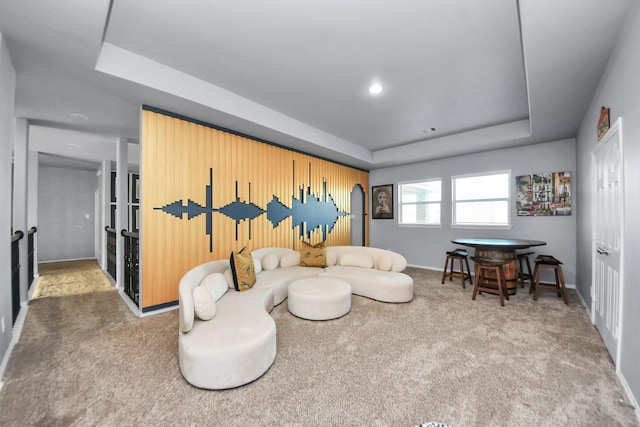 9003 Alps Peak Ct, Richmond, TX 77407 - living area featuring a tray ceiling, carpet flooring, and recessed lighting