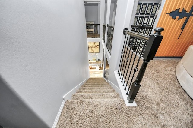 9003 Alps Peak Ct, Richmond, TX 77407 - stairway with carpet and a textured wall