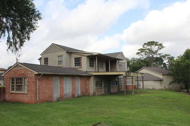 3603 Rio Vista St, Houston, TX 77021 - rear view of property with brick siding and a yard