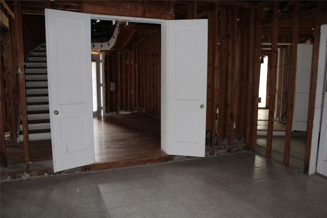 3603 Rio Vista St, Houston, TX 77021 - basement featuring stairway and tile patterned flooring