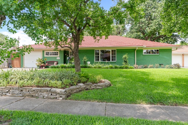 5022 Briarbend Dr, Houston, TX 77035 - single story home with a garage, a front yard, and a tiled roof