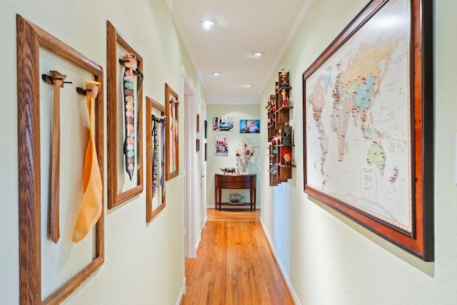 5022 Briarbend Dr, Houston, TX 77035 - hallway featuring light wood-style flooring, ornamental molding, and recessed lighting