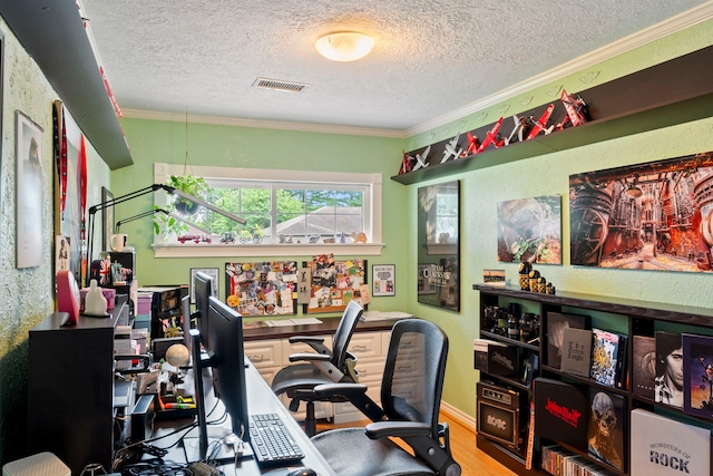 5022 Briarbend Dr, Houston, TX 77035 - home office with a textured ceiling, ornamental molding, and wood finished floors
