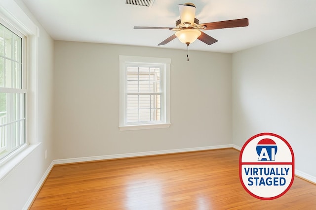 5022 Briarbend Dr, Houston, TX 77035 - empty room with light wood-type flooring and a ceiling fan