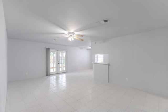 3906 Antoine Dr, Houston, TX 77092 - unfurnished room with ceiling fan, french doors, and light tile patterned flooring