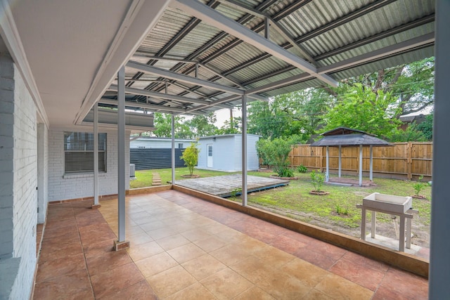 3906 Antoine Dr, Houston, TX 77092 - fenced backyard featuring a shed and a patio area