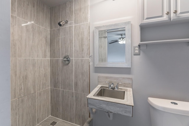 3906 Antoine Dr, Houston, TX 77092 - bathroom featuring tiled shower and a ceiling fan