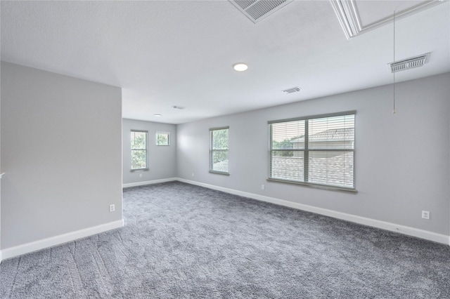 1810 Adobe Stone Dr, Humble, TX 77396 - carpeted empty room featuring attic access and baseboards