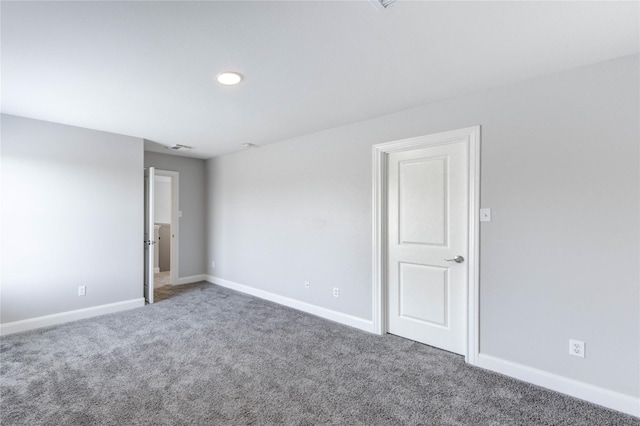 1810 Adobe Stone Dr, Humble, TX 77396 - carpeted spare room with baseboards and recessed lighting