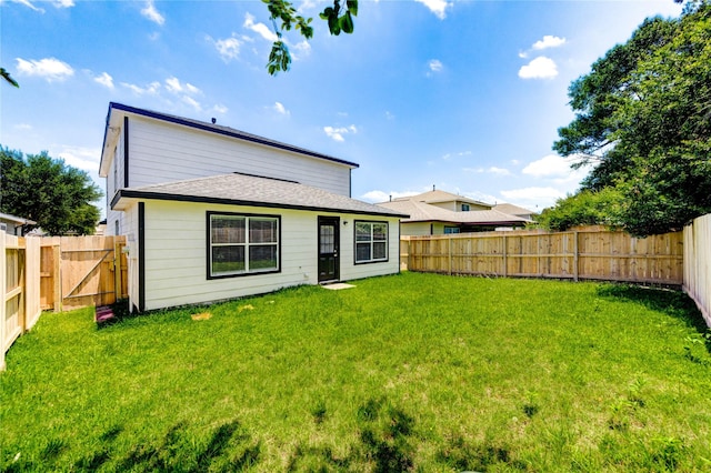 1810 Adobe Stone Dr, Humble, TX 77396 - back of property featuring a fenced backyard and roof with shingles