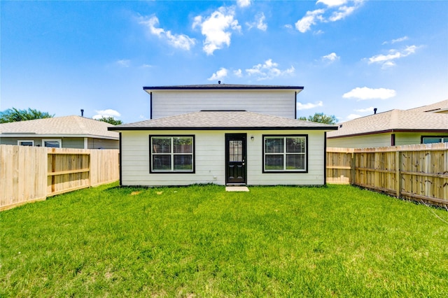 1810 Adobe Stone Dr, Humble, TX 77396 - rear view of house featuring a fenced backyard and roof with shingles