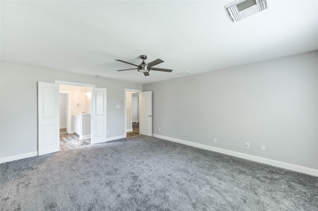 1810 Adobe Stone Dr, Humble, TX 77396 - unfurnished bedroom with carpet floors, ceiling fan, and ensuite bathroom
