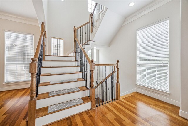 1316 Birdsall St, Houston, TX 77007 - stairs featuring wood finished floors, recessed lighting, and ornamental molding