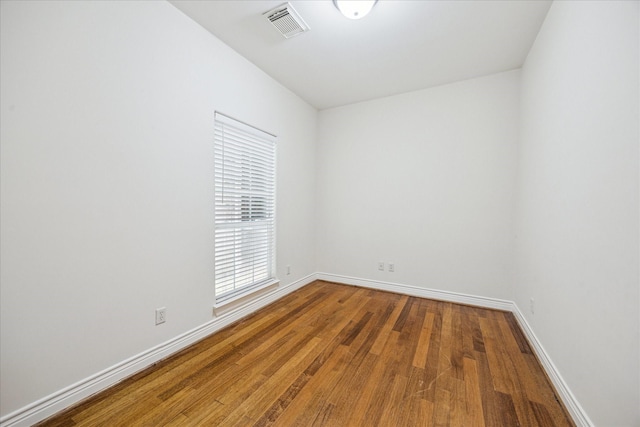 1316 Birdsall St, Houston, TX 77007 - unfurnished room featuring wood finished floors and baseboards