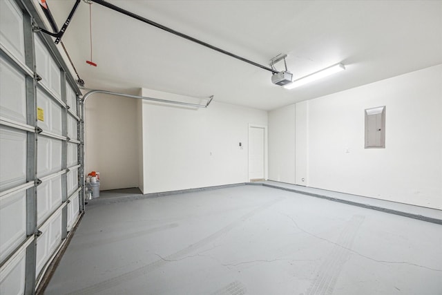 1316 Birdsall St, Houston, TX 77007 - garage featuring electric panel and a garage door opener