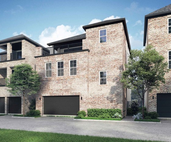6114 Cottage Grove Lake Dr, Houston, TX 77007 - view of building exterior with a garage