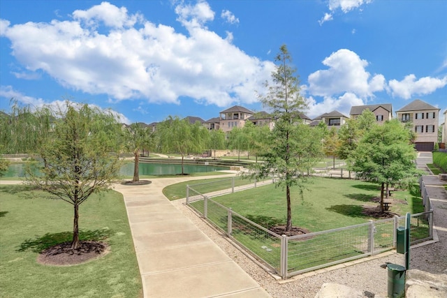 6114 Cottage Grove Lake Dr, Houston, TX 77007 - view of community featuring a water view and a gate