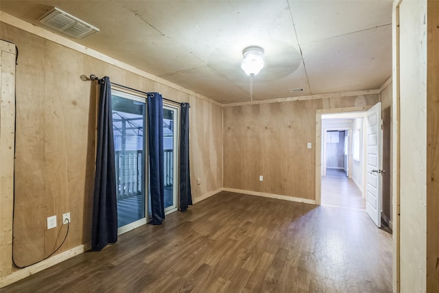 7528 Gainesville St, Houston, TX 77020 - spare room featuring wood finished floors