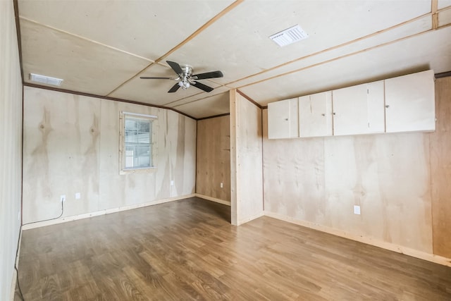 7528 Gainesville St, Houston, TX 77020 - spare room with vaulted ceiling, wood finished floors, and ceiling fan