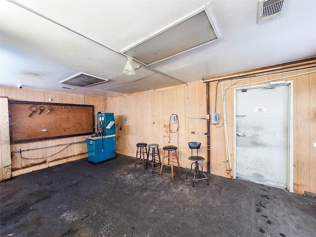 7528 Gainesville St, Houston, TX 77020 - garage featuring wooden walls