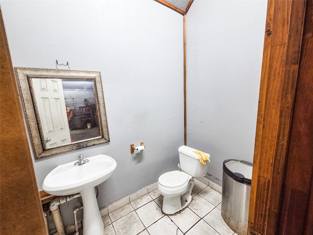 7528 Gainesville St, Houston, TX 77020 - half bathroom with toilet and tile patterned floors