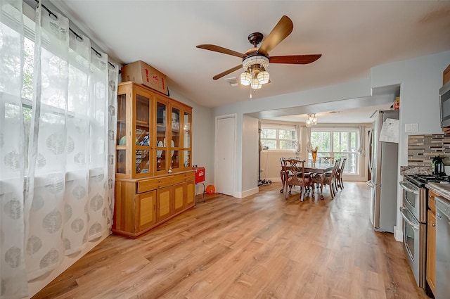 22914 Whittaker Way, Spring, TX 77373 - dining space featuring ceiling fan and light wood finished floors