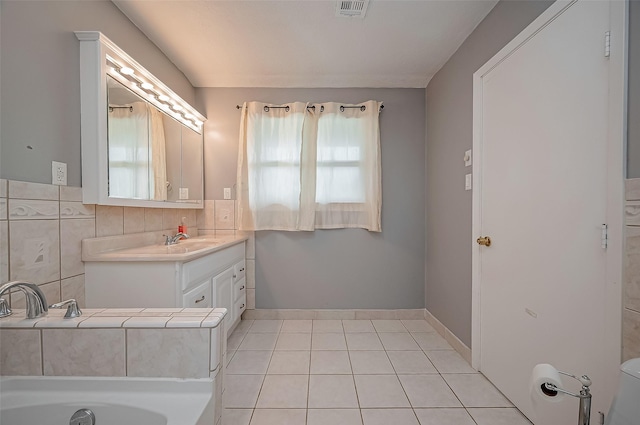 22914 Whittaker Way, Spring, TX 77373 - bathroom featuring vanity, a tub, and tile patterned floors
