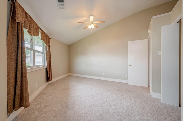 22914 Whittaker Way, Spring, TX 77373 - unfurnished room with vaulted ceiling, carpet floors, and a ceiling fan