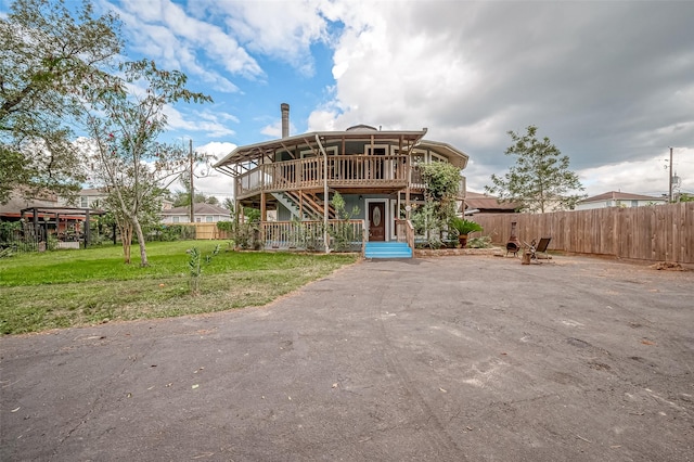 22914 Whittaker Way, Spring, TX 77373 - rear view of house featuring stairway