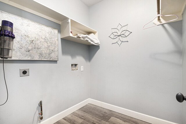 2032 Glencove Dr, Seabrook, TX 77586 - laundry room featuring hookup for a washing machine, wood finished floors, and hookup for an electric dryer