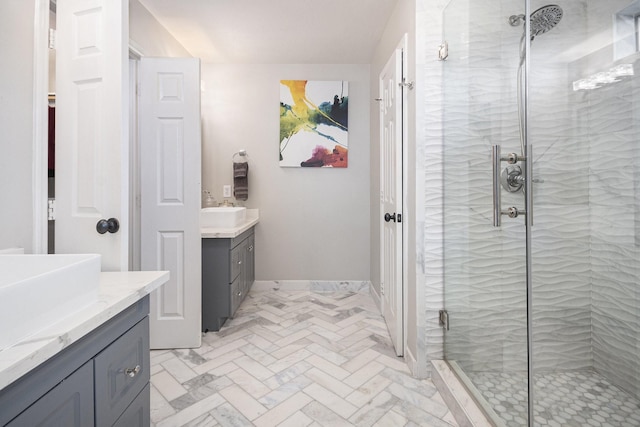 2032 Glencove Dr, Seabrook, TX 77586 - bathroom featuring two vanities, a shower stall, and brick patterned flooring