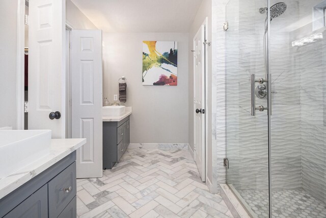 2032 Glencove Dr, Seabrook, TX 77586 - bathroom featuring two vanities, a shower stall, and brick patterned floors