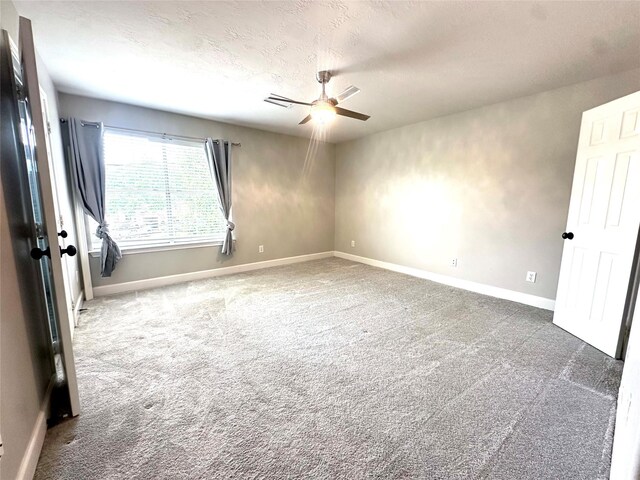 2032 Glencove Dr, Seabrook, TX 77586 - carpeted spare room with ceiling fan and baseboards