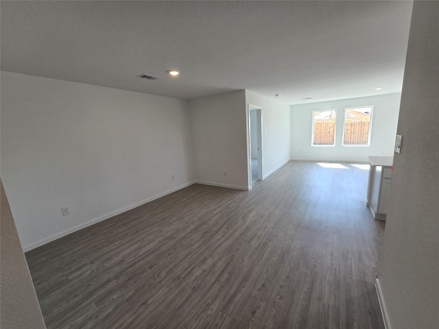 472 Shoreview Dr, Conroe, TX 77303 - spare room with dark wood-style flooring and recessed lighting