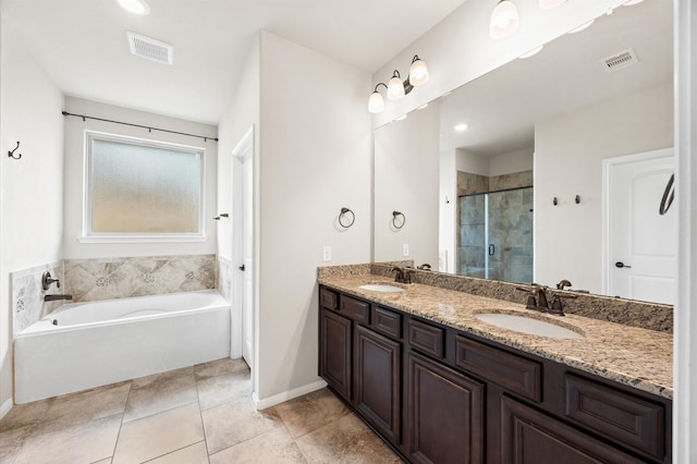 5107 Preserve Park Dr, Spring, TX 77389 - bathroom featuring a shower stall, double vanity, a garden tub, and tile patterned floors