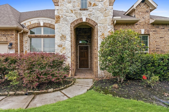 5107 Preserve Park Dr, Spring, TX 77389 - entrance to property with roof with shingles, stone siding, and brick siding