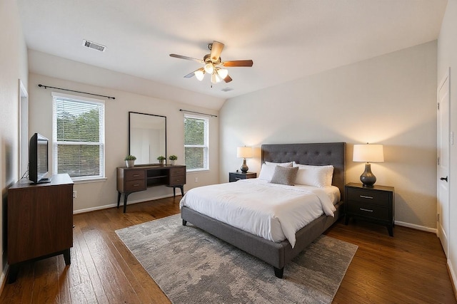 5107 Preserve Park Dr, Spring, TX 77389 - bedroom with multiple windows, wood-type flooring, and a ceiling fan