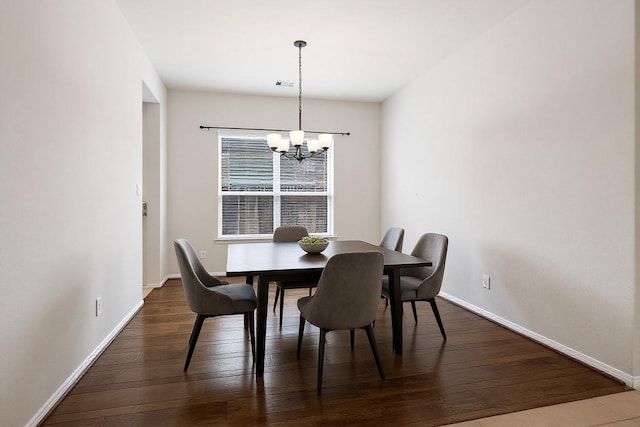 5107 Preserve Park Dr, Spring, TX 77389 - dining area featuring a chandelier and dark wood-style flooring