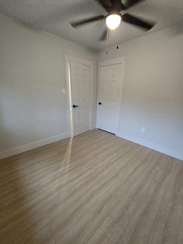 5326 Dewberry St, Houston, TX 77021 - spare room featuring ceiling fan and wood finished floors