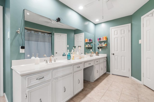 9611 Stockport Dr, Spring, TX 77379 - full bath featuring a ceiling fan, double vanity, and recessed lighting