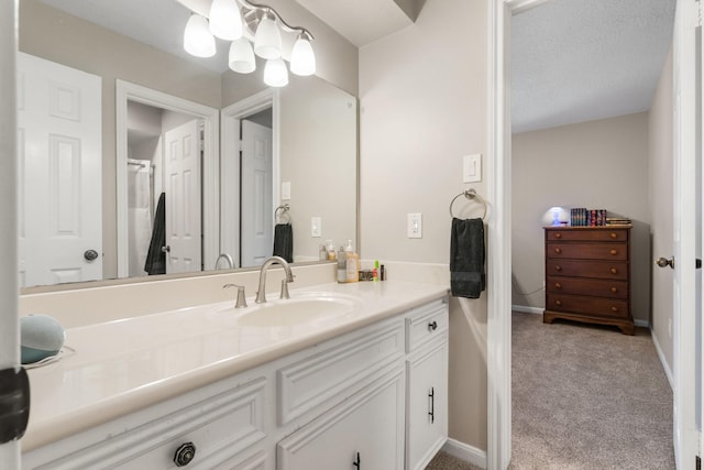 9611 Stockport Dr, Spring, TX 77379 - bathroom featuring vanity and baseboards