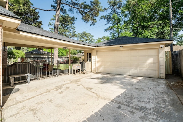 9611 Stockport Dr, Spring, TX 77379 - garage featuring concrete driveway