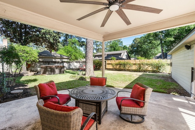 9611 Stockport Dr, Spring, TX 77379 - fenced backyard with a hot tub, ceiling fan, and a patio