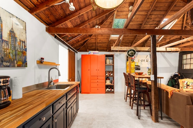 3809 Billingsley St, Houston, TX 77009 - kitchen featuring wooden ceiling, open shelves, and wood counters