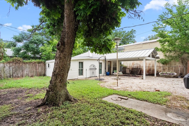 3809 Billingsley St, Houston, TX 77009 - back of house featuring a patio and a metal roof
