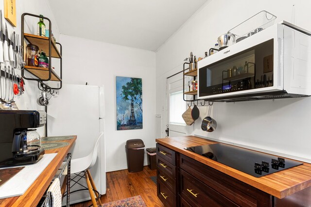 3809 Billingsley St, Houston, TX 77009 - kitchen featuring wooden counters, white appliances, open shelves, dark wood-style floors, and dark brown cabinetry